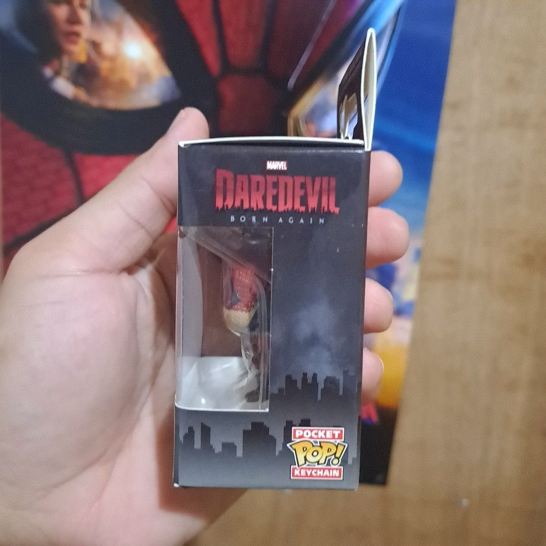 Funko Pocket POP! Keychain Daredevil (Category: Western Merchandise) located in Manila. Submitted by free_joe (Listing ID 1466806182, Image 3). Description: - Official Marvel merchandise - Character: Daredevil (Born Again) - Type: Funko Pocket Pop Keychain - Condition: Brand new, unopened in original window display box - Perfect collectible for Marvel fans - Can be attached to keys, bags, or backpacks.