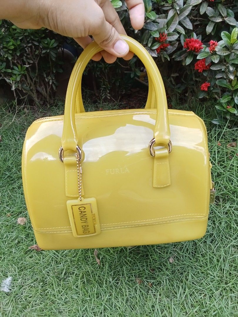 FURLA CANDY BAG SMALL (Category: Tote Bags) located in Vinzons. Submitted by gracecollectionsph09 (Listing ID 1466908540, Image 1). Description: GOOD CONDITION MINIMAL COLOR TRANSFER WITH PADLOCK PAYMENT FIRST BICOL LOCATION.