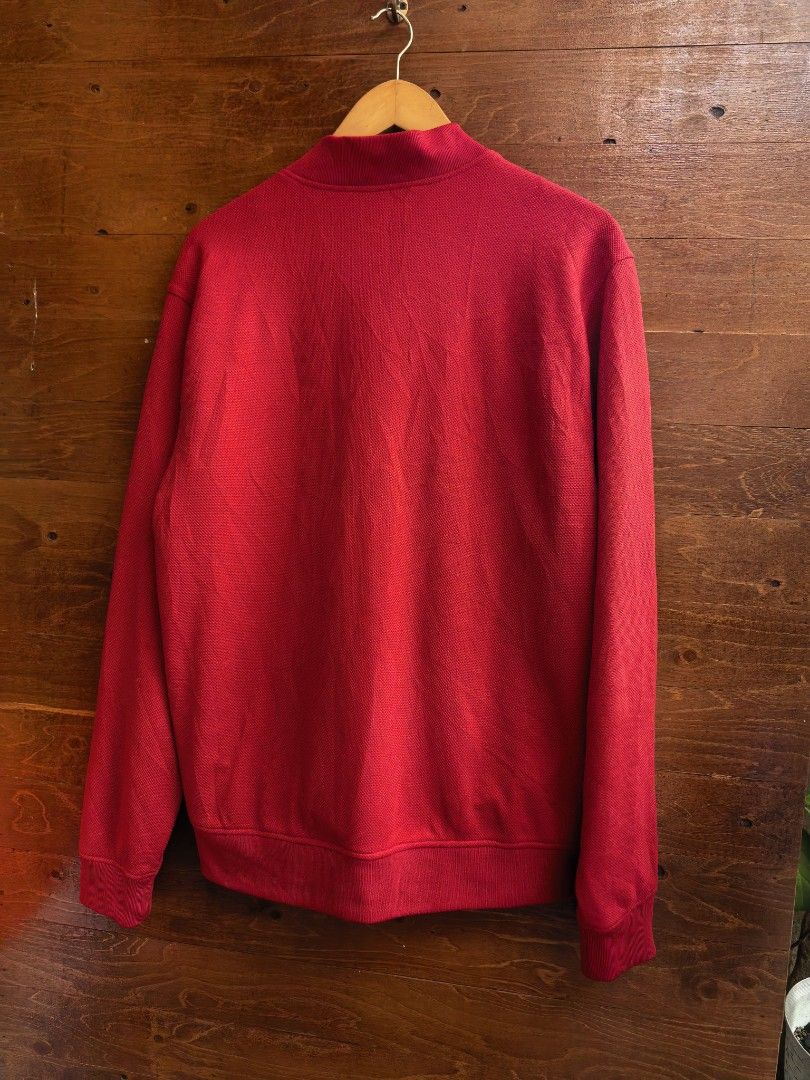 G by Guess Red Bomber Jacket XL (Category: Coats, Jackets and Outerwear) located in Paranaque City. Submitted by caboodlespremium (Listing ID 1466780853, Image 3). Description: - Brand: G by Guess - Size: XL L- 77cm W-53.5cm - Color: Bright red with subtle textured pattern - Closure: Zip-up front - Pockets: Zipped pockets on both sides - Details: Black inner lining, branded collar tag, ribbed collar, cuffs, and hem - Condition: Clean overall.