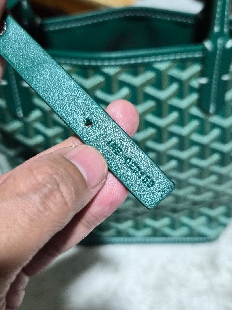 G o yard Green Tote Bag (Category: Luxury Bags & Wallets) located in Mandaue City. Submitted by chuchi152615 (Listing ID 1466968050, Image 2). Description: - Green Goyard tote bag with signature chevron pattern - Elegant contrast white stitching along edges and double handles - Clean interior lining with a structured base - Silver foil stamped 'Goyard Paris Made in France' branding - Serial number stamped on interior leather tab: IAE 020159.