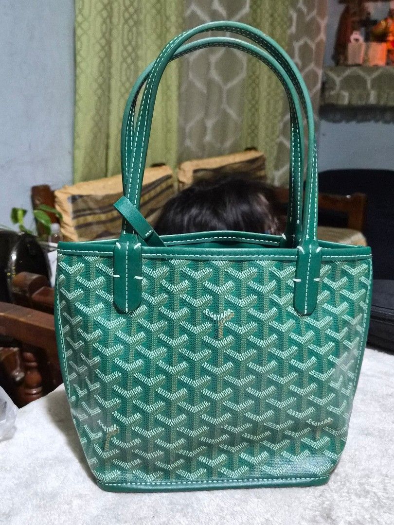 G o yard Green Tote Bag (Category: Luxury Bags & Wallets) located in Mandaue City. Submitted by chuchi152615 (Listing ID 1466968050, Image 1). Description: - Green Goyard tote bag with signature chevron pattern - Elegant contrast white stitching along edges and double handles - Clean interior lining with a structured base - Silver foil stamped 'Goyard Paris Made in France' branding - Serial number stamped on interior leather tab: IAE 020159.