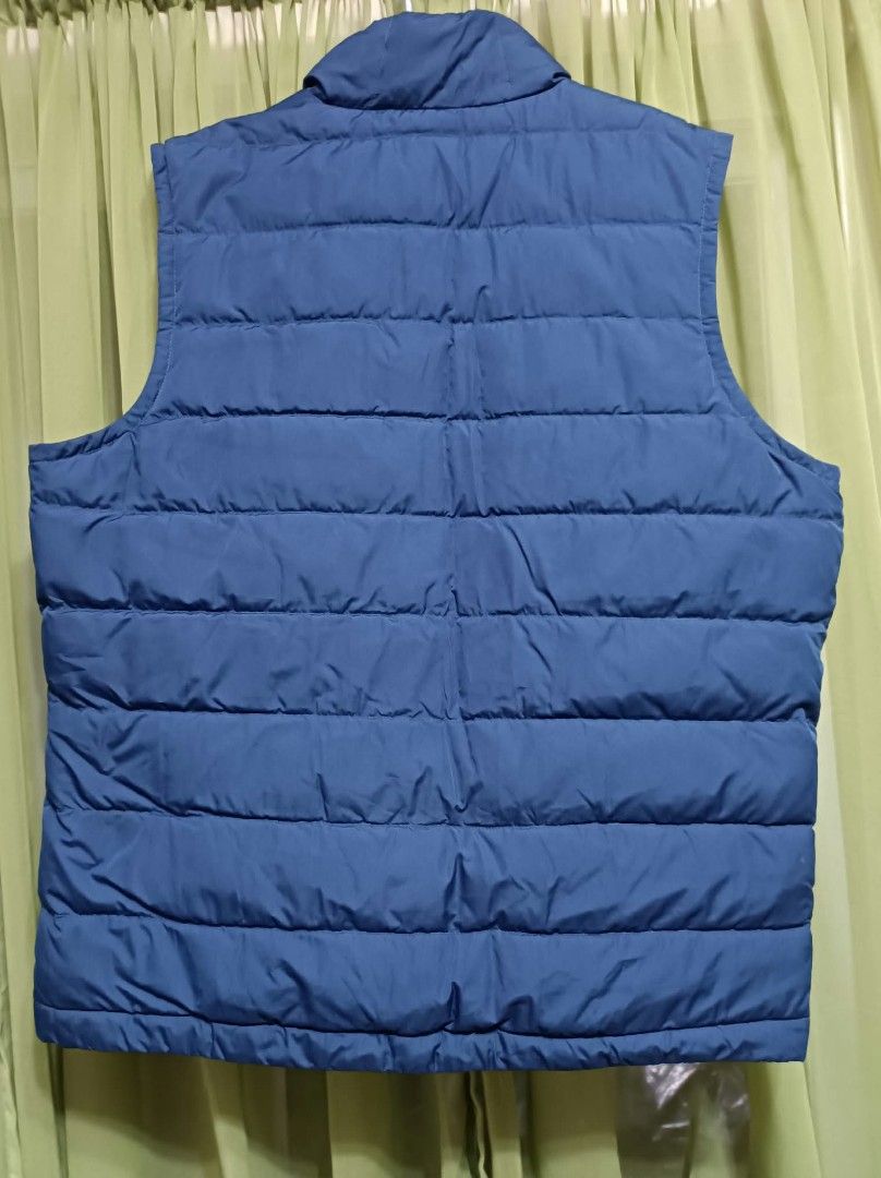 Gap Blue Puffer Vest (Category: Vests) located in Bocaue. Submitted by lalamovexthriftselect (Listing ID 1466961902, Image 2). Description: - Brand: GAP - Color: Blue with contrast olive green inner lining - Style: Puffer vest with full zip front and stand-up collar - Features: Two front zippered pockets and quilted horizontal stitching - Condition: Excellent pre-loved / great layering piece GCash - Shipping: Same day delivery via Lalamove/Grab (