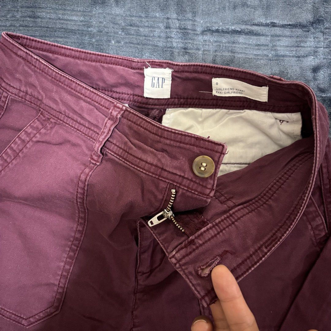 Gap Girlfriend Khaki Pants Maroon Size 0 (Category: Jeans) located in Balayan. Submitted by authenticfindsbymrb (Listing ID 1466852485, Image 2). Description: - Brand: Gap - Style: Girlfriend Khaki Pants - Color: Rich maroon burgundy - Size: 0 - Fit: High-rise - Details: Front patch pockets, button-zipper fly closure, sturdy cotton fabric with a casual worn-in look - Condition/Vibe: Great everyday bottoms, easy to pair with tees and sweaters -up 