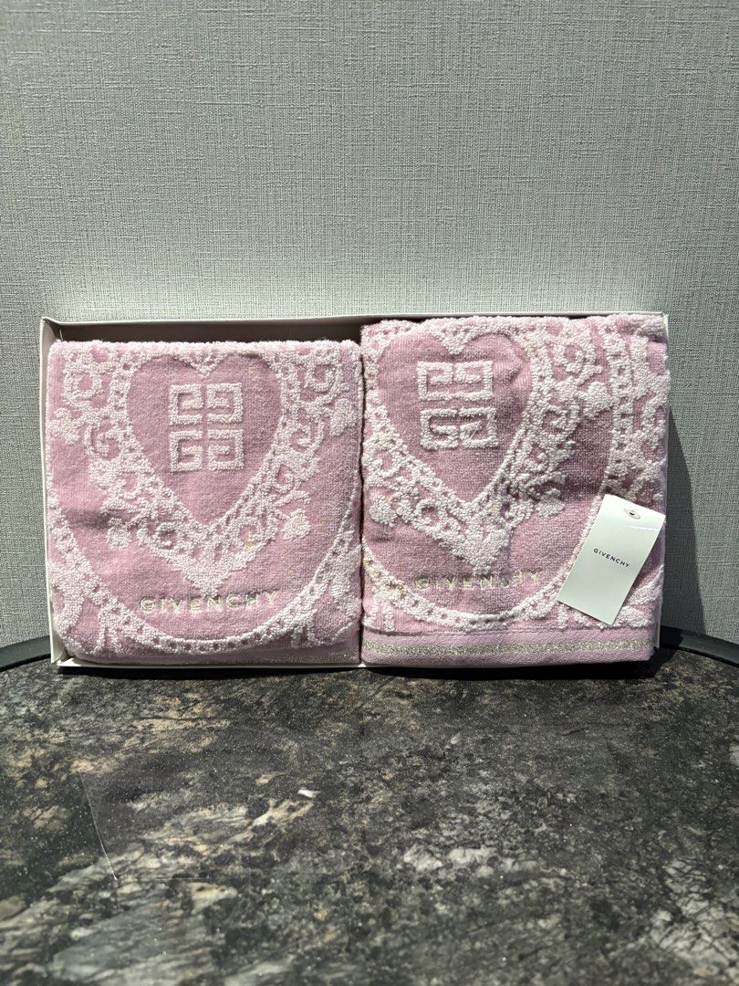Givenchy Pink Heart Pattern Towel Set in Box (Category: Bedding & Towels) located in Manila. Submitted by foundhouseph (Listing ID 1466935227, Image 1). Description: - Brand: Authentic Givenchy - Item: Pink towel set with heart lace pattern, embroidered logo, and silver trim - Condition: Brand new in original box with store tag attached - Size: 36x40cm - Flaw Notice: Has minor yellowish spots from storage over time (please check close-up photos).