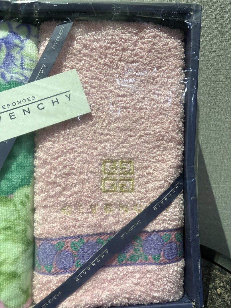 Givenchy Towel Set Floral Pattern in Box (Category: Bedding & Towels) located in Manila. Submitted by foundhouseph (Listing ID 1466929351, Image 3). Description: - Brand: Authentic Givenchy towel set -Price: 750php - Includes: 2 premium towels with pink, green, and purple floral prints - 1 bath towel and 1 long face towel -Size: Bath Towel: 120x60cm. Face Towel: 74x33cm - Details: Features elegant embroidered logo accents - Packaging: Comes in or