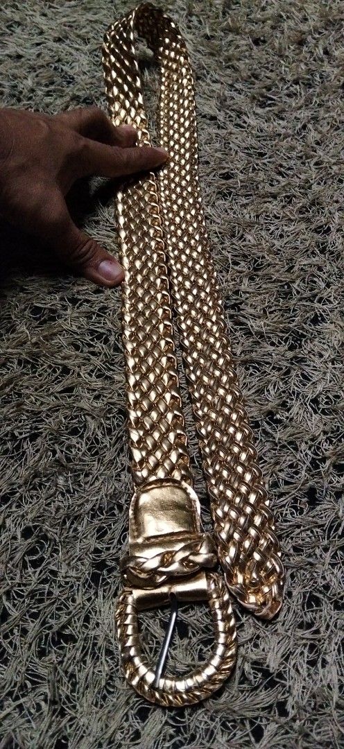 Gold braided metallic belt with buckle (Category: Belts) located in Paranaque City. Submitted by michael-08 (Listing ID 1466854473, Image 3). Description: - Bright gold metallic finish with an all-over woven braided texture - Features a sleek oval buckle and matching keeper loop - Standard pin closure for an adjustable, secure fit - Catch-the-light shiny design perfect for dressing up simple outfits WALA PO ISSUE GOOD GONDITION WALANG TULAP BAKBA