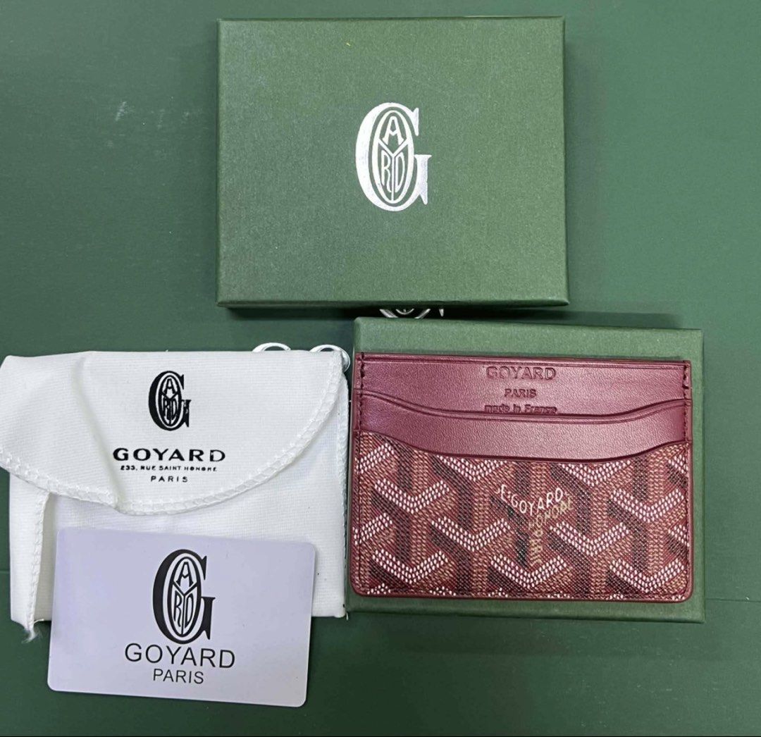 Goyard Card Holder (Category: Luxury Bags & Wallets) located in Santa Rosa. Submitted by pure.taftshop (Listing ID 1466922883, Image 3). Description: - Brand: Goyard Saint Sulpice - Material: Premium coated canvas with leather trim - Design: Classic chevron pattern with clean stitching - Compartments: Multiple card slots on both sides and a convenient middle pocket - Colors: Available in multiple stunning color options - Inclusions: Complete with