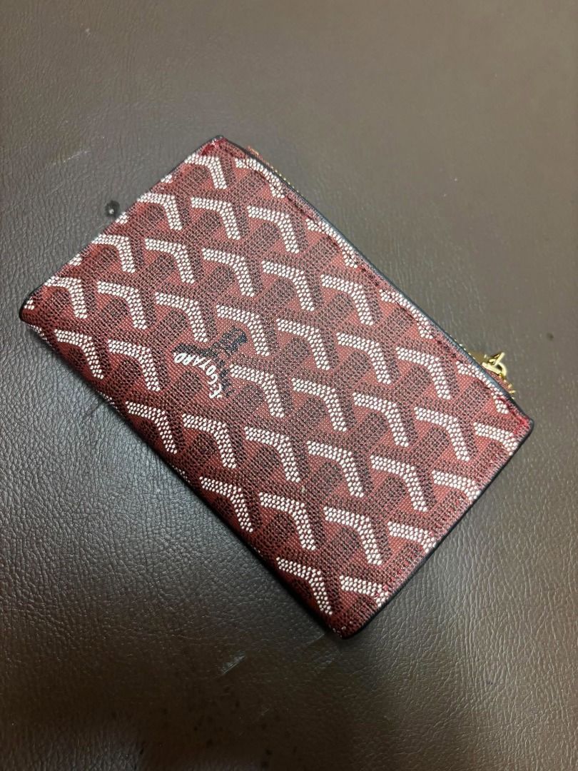 Goyard Saint-Sulpice Card Holder | Red (Category: Wallets & Card holders) located in Bacoor. Submitted by fafofa (Listing ID 1466966890, Image 2). Description: Red card holder featuring Goyardine-style coated canvas, leather trim, and a gold-tone plaque. Red coated canvas with patterned design Leather trim Gold-tone “GOYARD PARIS” plaque Top zippered compartment Compact design for cards and small essentials.
