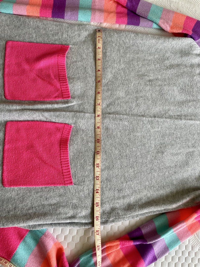 Gray Striped Knitted Sweater Dress (Category: Dresses) located in Taguig. Submitted by lam_decluttering (Listing ID 1466797980, Image 3). Description: - Enid Sinclair inspired look for Halloween - Teen Style: Gray knit sweater dress with fun, colorful striped sleeves (purple, pink, orange, turquoise) - Details: Hot pink ribbed trim on collar, cuffs, hem, and two functional front patch pockets - Material: Super soft and cozy fabric perfect for eve