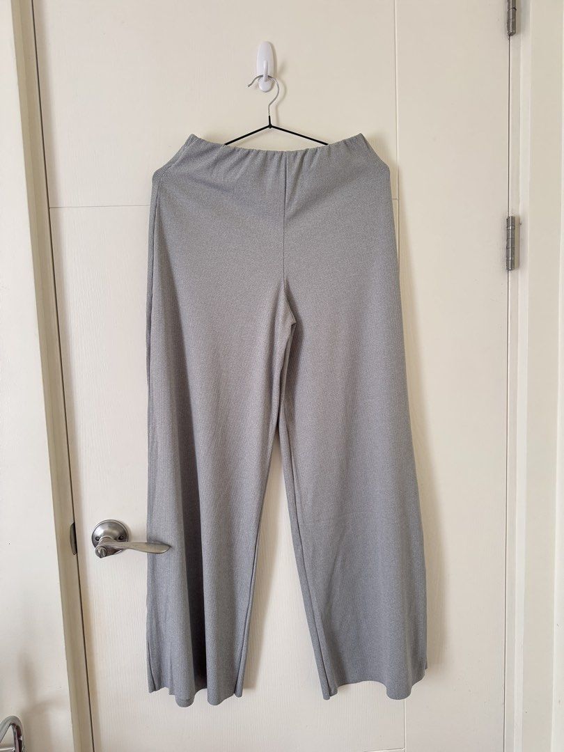 Grey Ribbed Wide Leg Pants (Category: Jeans) located in Mandaluyong City. Submitted by trinket.ph (Listing ID 1466774833, Image 1). Description: - this has a tube terno. Ill include it also -Color: Grey - Style: Wide leg pants with textured vertical lines - Material: Super stretchy and comfortable ribbed knit fabric - Features: Easy elastic waistband - Perfect for: Casual days out or cozy lounging at home.