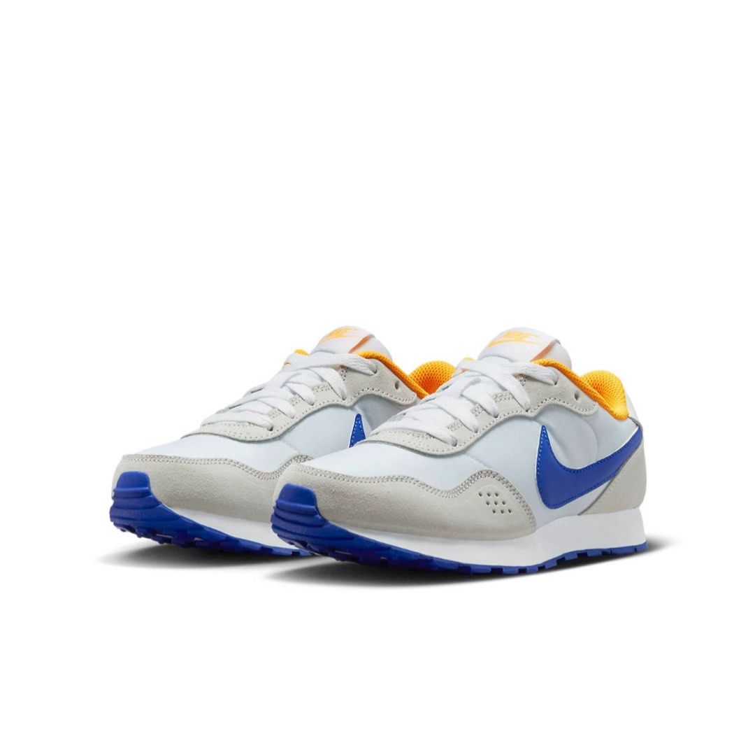 GS) Nike MD Valiant 'Summit White Racer Blue' (Category: Sneakers) located in Mabalacat. Submitted by .jellyfish_ (Listing ID 1461878608, Image 2). Description: - White sneakers with a pop of yellow inner lining and blue accents. - Classic white laces. - Designed for everyday comfort. - Perfect for your next adventure!.