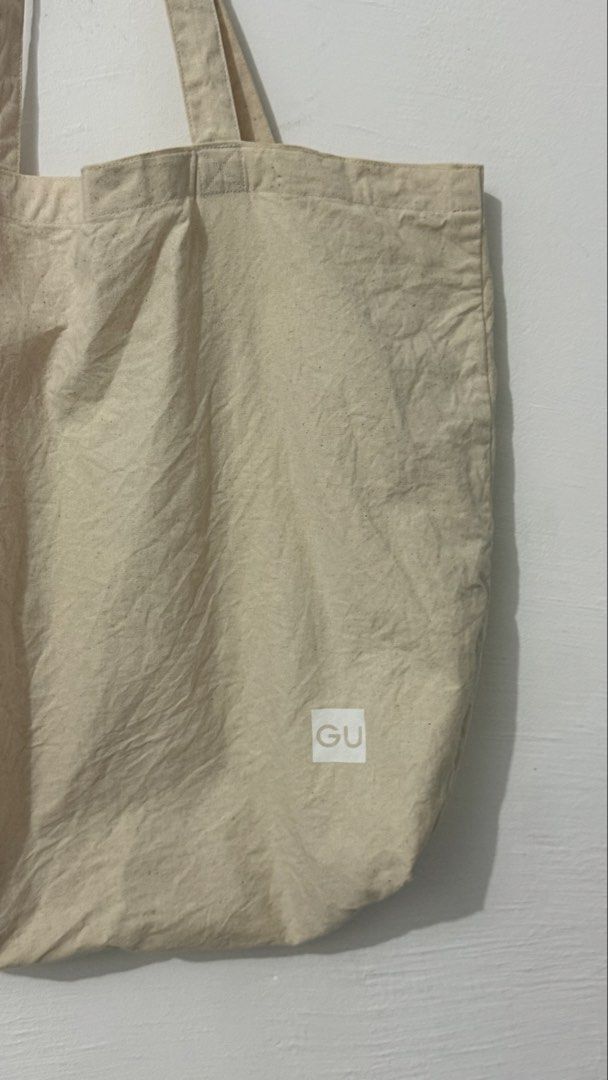 GU CANVASS TOTE BAG (Category: Tote Bags) located in Cordova. Submitted by thedecluterrer (Listing ID 1466787059, Image 2). Description: .
