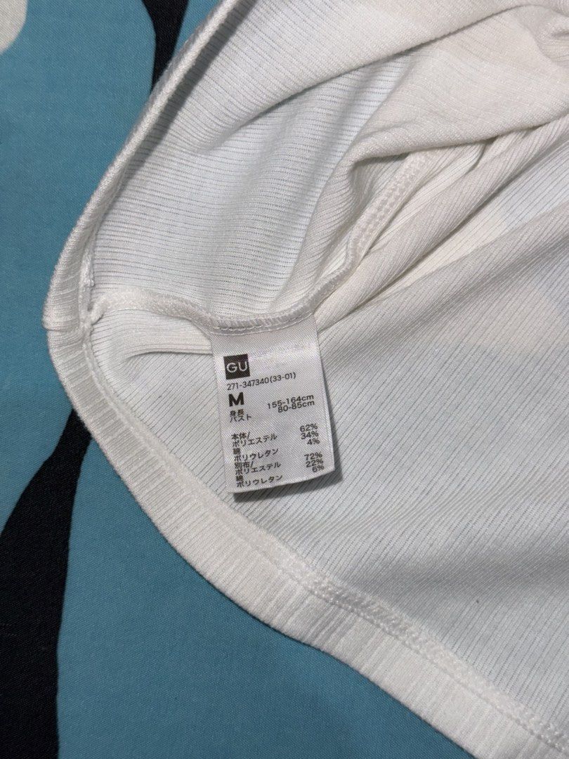 GU White Tank Top (Category: Sleeveless) located in Naga. Submitted by sbcookieee (Listing ID 1466841009, Image 3). Description: .