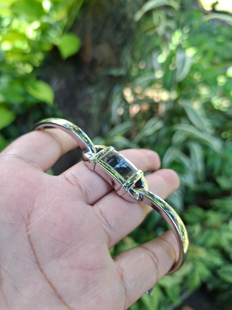 Gucci Bangle (Category: Men's Watches) located in Valenzuela. Submitted by luxxydeals (Listing ID 1466793075, Image 2). Description: Gucci Bangle Watch Only Model: Gucci 6800L Movement: Quartz Price: 10,000php Meet up: Metro Manila, Philippines Shipping Via LBC - Buyer’s Expense Lalamove - Payment First Sale ✅ Trade ✅ Payment: Cash/Gcash/Bank Transfer/Credit Card Disclaimer: This is a preloved watch. Please expect minor signs of wear, scratches, 