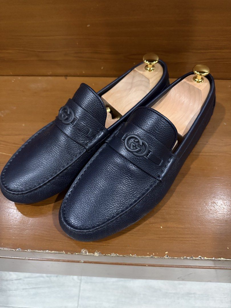 Gucci Leather Driving Loafers Navy Blue (Category: Loafers) located in Paranaque City. Submitted by mikko0524 (Listing ID 1466885607, Image 1). Description: - Brand: Gucci - Color: Navy Blue - Size: 42EU - Material: Genuine pebbled leather - Style: Slip-on driving loafers - Details: Iconic interlocking G logo on the strap and embossed rubber sole pods - Inclusion: Shoes only - Condition: Clean interior and well-maintained.