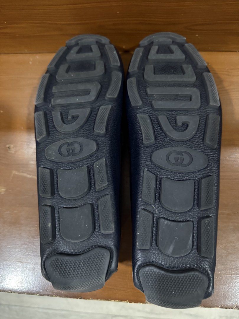 Gucci Leather Driving Loafers Navy Blue (Category: Loafers) located in Paranaque City. Submitted by mikko0524 (Listing ID 1466885607, Image 2). Description: - Brand: Gucci - Color: Navy Blue - Size: 42EU - Material: Genuine pebbled leather - Style: Slip-on driving loafers - Details: Iconic interlocking G logo on the strap and embossed rubber sole pods - Inclusion: Shoes only - Condition: Clean interior and well-maintained.