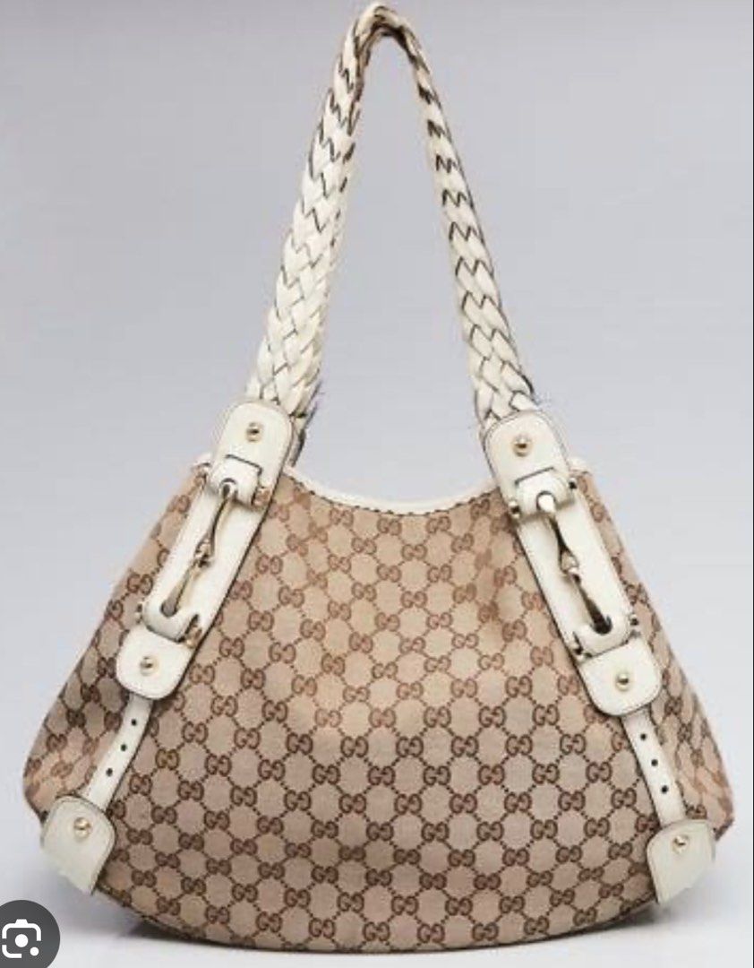 Gucci Pelham Tote Bag (Category: Tote Bags) located in Bulacan. Submitted by mersain (Listing ID 1466951192, Image 1). Description: MESSAGE FOR ACTUAL PICS NALANG PO! - vintage Gucci monogram canvas shoulder bag - Iconic beige and brown GG pattern with cream white leather trim - Elegant braided top handles for comfortable carrying - Silver-tone hardware with signature horsebit details - Spacious interior for all your daily essentials - Structured