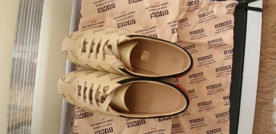 Gucci Spring Summer 2018 Print Leather Sneakers (Category: Sneakers & Footwear) located in Taguig. Submitted by nmgutzy (Listing ID 1466826985, Image 3). Description: - Authentic Gucci Low-Top Leather Sneakers from the SS18 collection - Pristine condition with zero signs of wear - Features all-over print, metallic red heel counters with gold bee embroidery, and black collar trim - Includes cream laces and classic gum soles - Comes complete with o