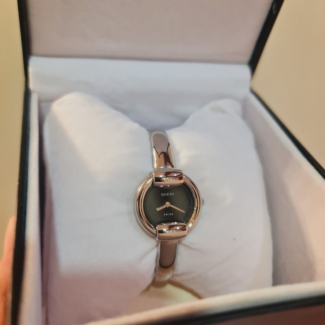 Gucci Watch Black Dial (Category: Women's Watches) located in Navotas City. Submitted by ryjayshoppe (Listing ID 1466868474, Image 3). Description: Onhand and Ready to ship Original Preloved GG Watch in Silver Tone Almost New Condition!🥰Makinis❤️ S-m size up to 17.5cm with Original Box Last Price Posted!Low ballers will not entertained! Free shipping nationwide! 📌DISCLAIMER📌 We are not affiliated, associated, or in any way officially connected