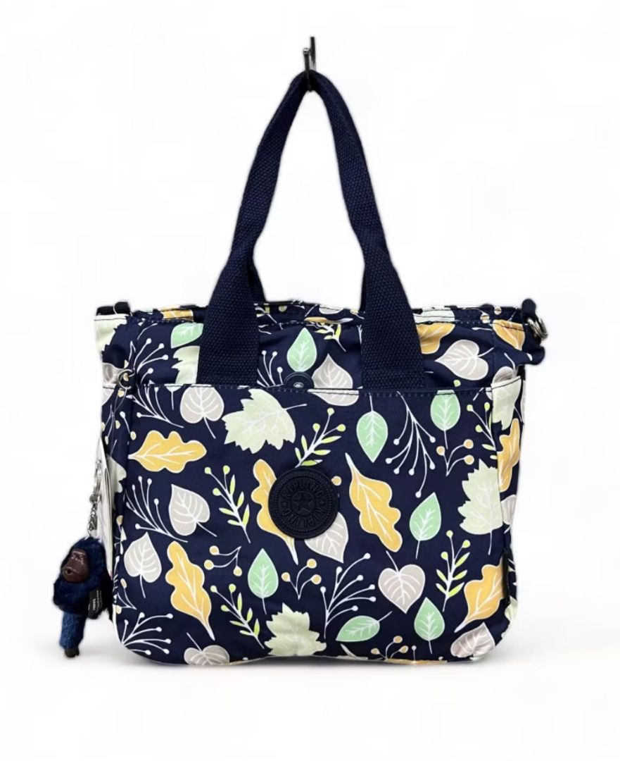 Kipling medium sized tote (Category: Tote Bags) located in Caloocan City. Submitted by crateandbarrel (Listing ID 1466813657, Image 2). Description: Please advise color of preference Kipling w/ front and back zipper pocket Size : 12 inches Color: Black , Navy Blue , Royal Blue Inclusion : Sling Strap Monkey Keychain.