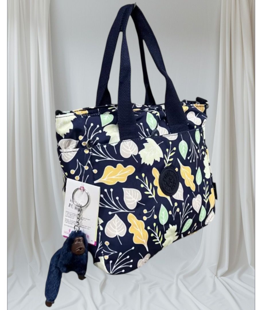 Kipling medium sized tote (Category: Tote Bags) located in Caloocan City. Submitted by crateandbarrel (Listing ID 1466813657, Image 1). Description: Please advise color of preference Kipling w/ front and back zipper pocket Size : 12 inches Color: Black , Navy Blue , Royal Blue Inclusion : Sling Strap Monkey Keychain.