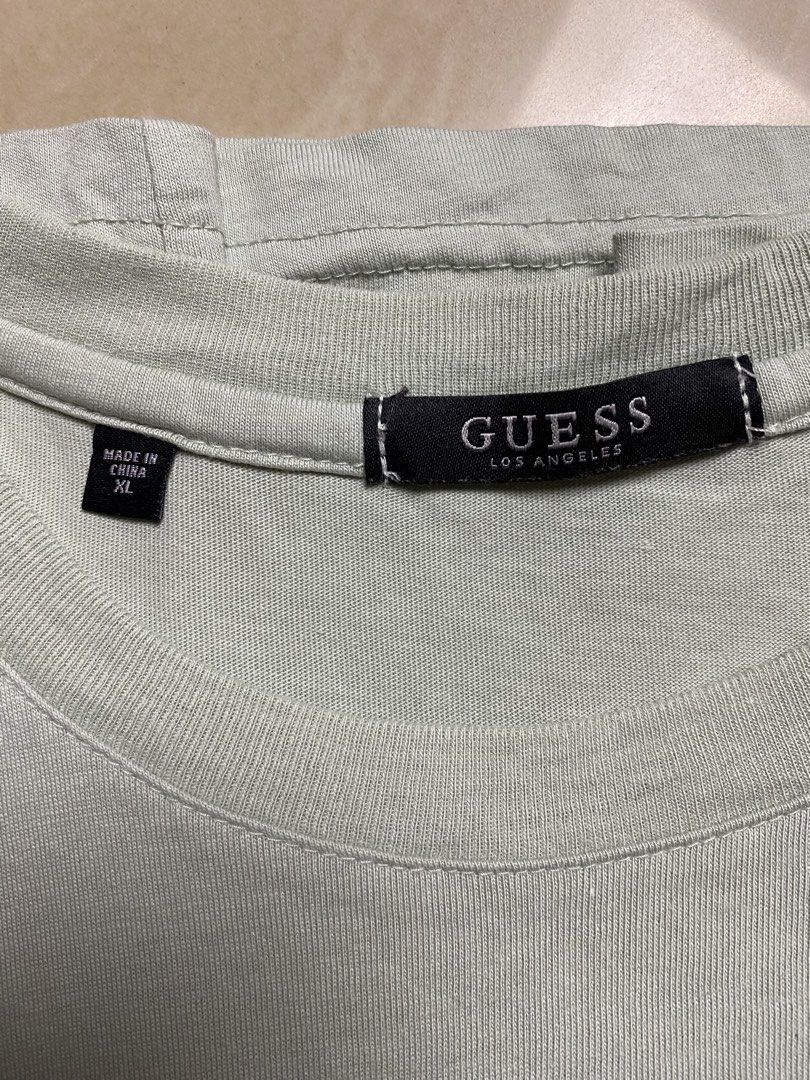 GUESS (Category: Tshirts & Polo Shirts ) located in Davao. Submitted by maikes_finds (Listing ID 1466908902, Image 3). Description: SIZE XLARGE NO ISSUE 22x28 .