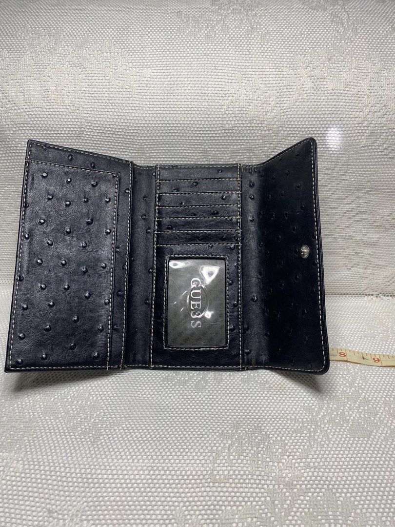 Guess wallet (Category: Wallets & Card holders) located in Angeles City. Submitted by noagrace (Listing ID 1466785396, Image 3). Description: Guess long wallet Canvas, faux leather material Normal signs of use Needs cleaning P350.