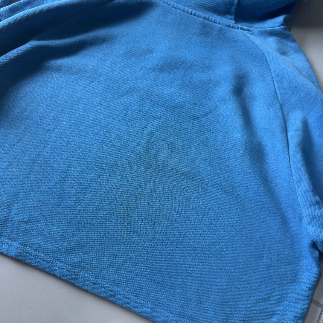Gymshark Cropped Blue Jacket (Category: Activewear) located in Pasig City. Submitted by sofgatch (Listing ID 1466851562, Image 3). Description: There is significant wear on the mesh part of the jacket, and also some light staining (from ironing). .