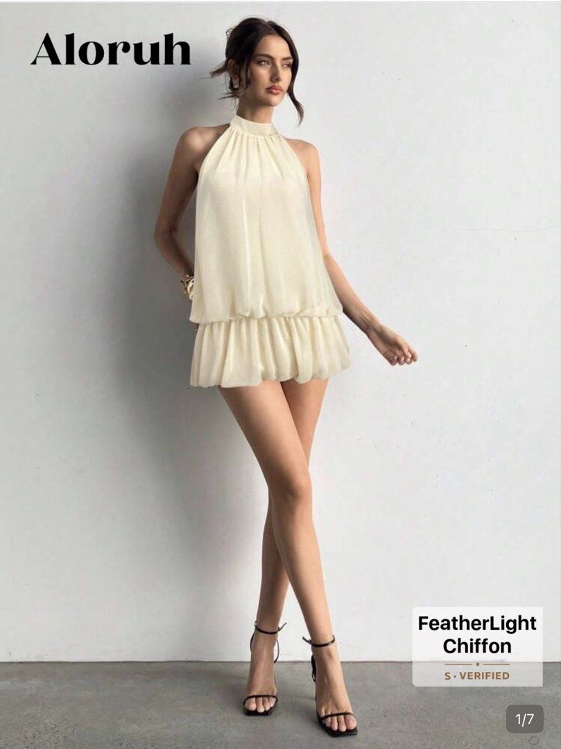 halter neck ruffle hem mini dress (Category: Dresses) located in Manila. Submitted by samllian (Listing ID 1466969004, Image 1). Description: only used once.