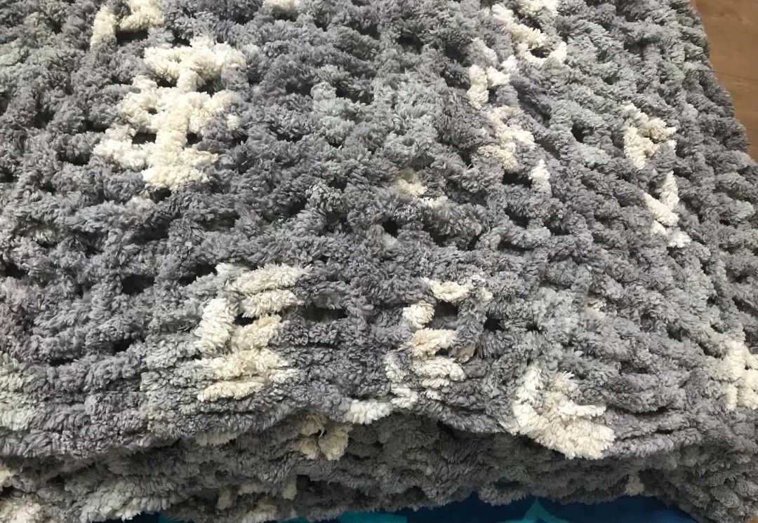 Handmade Grey and White Chunky Knit Blanket (Category: Bedding & Towels) located in Imus. Submitted by stop_shop7 (Listing ID 1466810282, Image 2). Description: - Material: Super soft and plush chenille yarn - Design: Open waffle weave grid pattern in stylish grey and cream white tones - Feel: Thick, heavy, and very warm - Use: Perfect as a cozy throw blanket for your couch or bed - Craftsmanship: Beautifully handmade for a premium look.