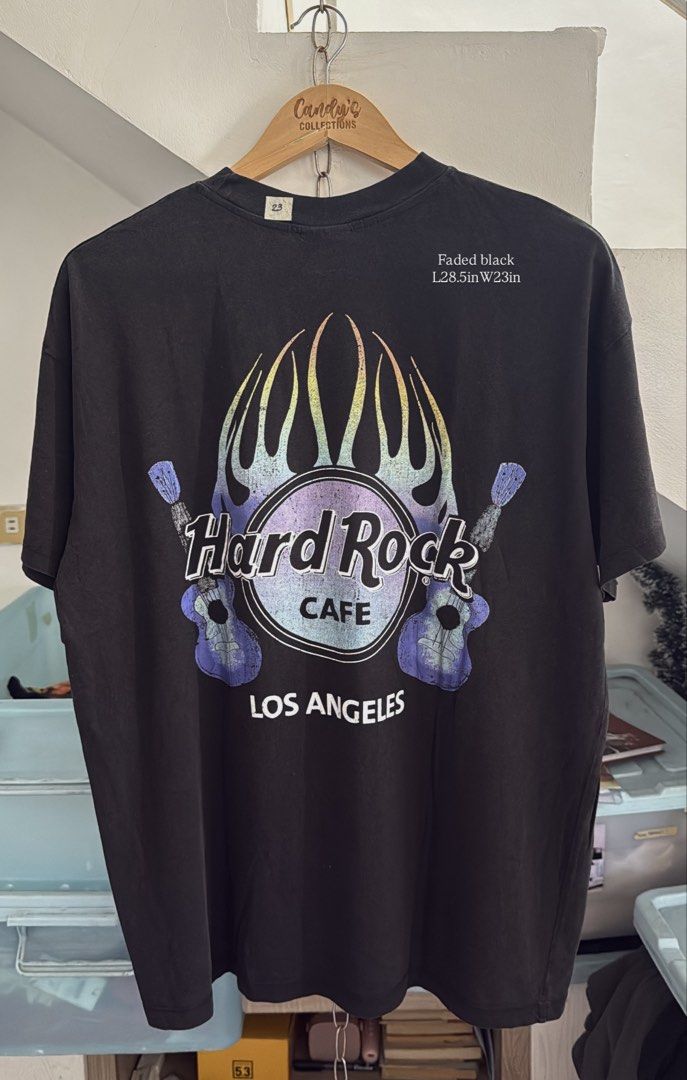 HARD ROCK (Category: Tshirts & Polo Shirts ) located in Cavite. Submitted by handpickedshirts (Listing ID 1466781348, Image 1). Description: Brand new Faded black fabric - style Faded prints - style Approx L30in W23in laid flat Best fits L/XL frames.