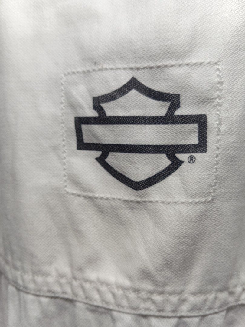 Harley Davidson Genuine Clothes Button-Up Shirt White (Category: Tshirts & Polo Shirts ) located in Manila. Submitted by newfish_883539 (Listing ID 1466870831, Image 3). Description: Brand: Harley-Davidson (Genuine Clothes / An American Legend line) Size: XL (Extra Large) Color: Cream / Off-White Material: 100% Premium Cotton Key Features: • Left chest: Embroidered retro circular Harley-Davidson Motorcycles logo. • Upper back: Stitched Harley-Dav
