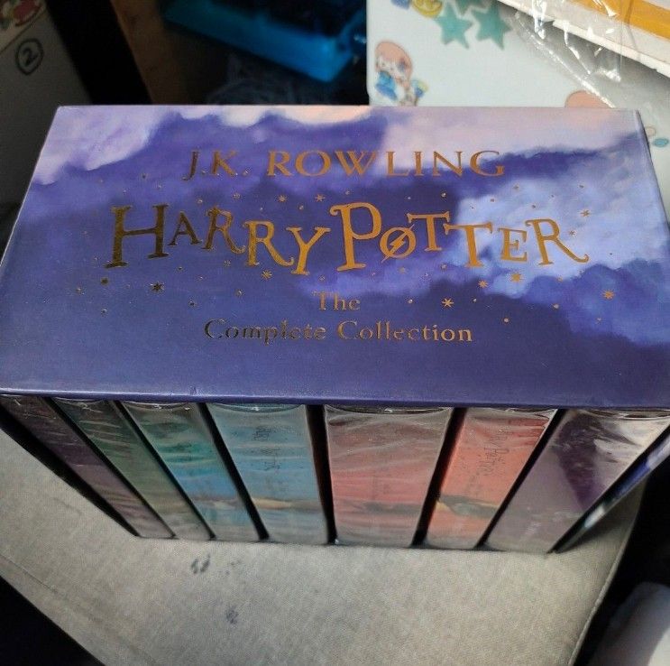 Harry Potter The Complete Collection Box Set J.K. Rowling (Category: Storybooks) located in Quezon City. Submitted by dncpreloved (Listing ID 1466883950, Image 2). Description: - Complete 7-book Harry Potter paperback series with original storage box - Books 1 to 5 are plastic wrapped - Original storage box included (has minor wear at one corner) - Ideal for collectors or anyone starting their magical reading journey.
