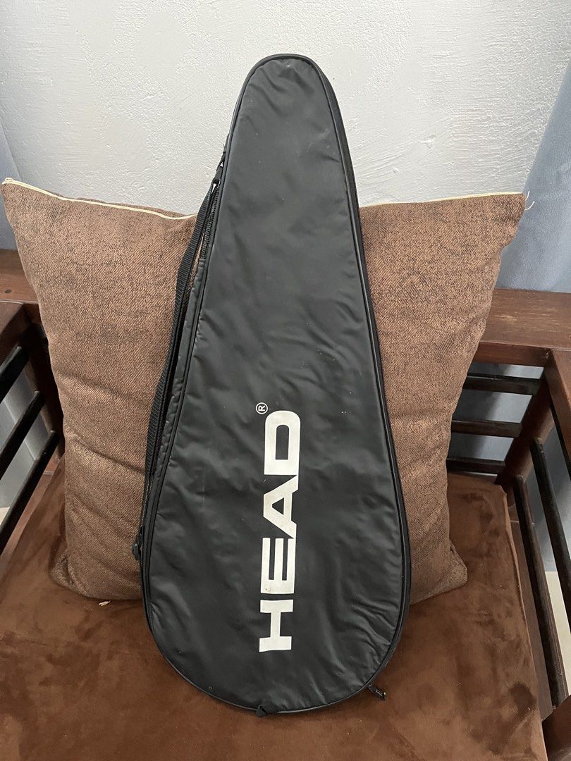 HEAD Black Tennis Racket Bag Cover (Category: Racket and Ball Sports) located in Antipolo. Submitted by jccruise (Listing ID 1466812375, Image 1). Description: - Authentic Black Head tennis racket bag - Bold white brand logo on one side and Head icon on the reverse - Secure full-zip closure down the middle - Fully lined black interior to protect your gear - Includes a convenient attached shoulder strap for easy carrying - Ideal for safe transport
