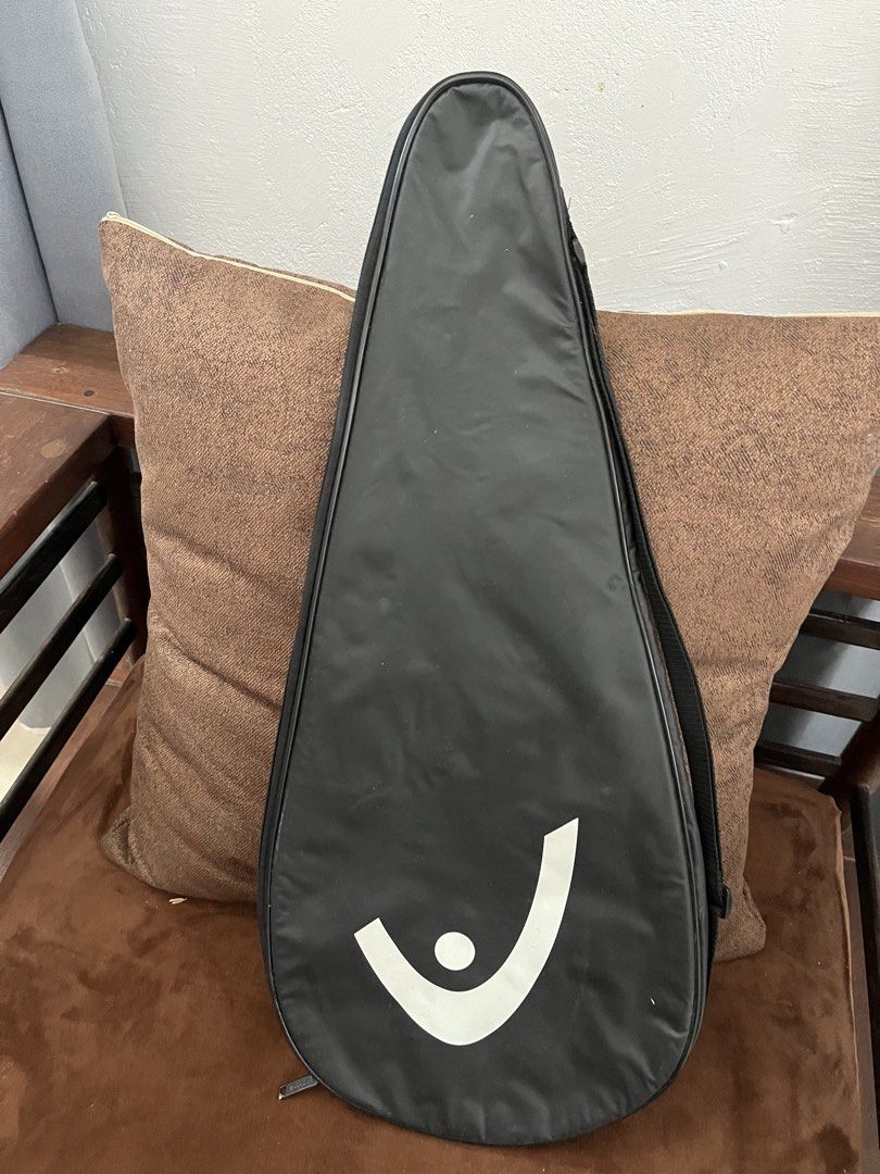 HEAD Black Tennis Racket Bag Cover (Category: Racket and Ball Sports) located in Antipolo. Submitted by jccruise (Listing ID 1466812375, Image 2). Description: - Authentic Black Head tennis racket bag - Bold white brand logo on one side and Head icon on the reverse - Secure full-zip closure down the middle - Fully lined black interior to protect your gear - Includes a convenient attached shoulder strap for easy carrying - Ideal for safe transport
