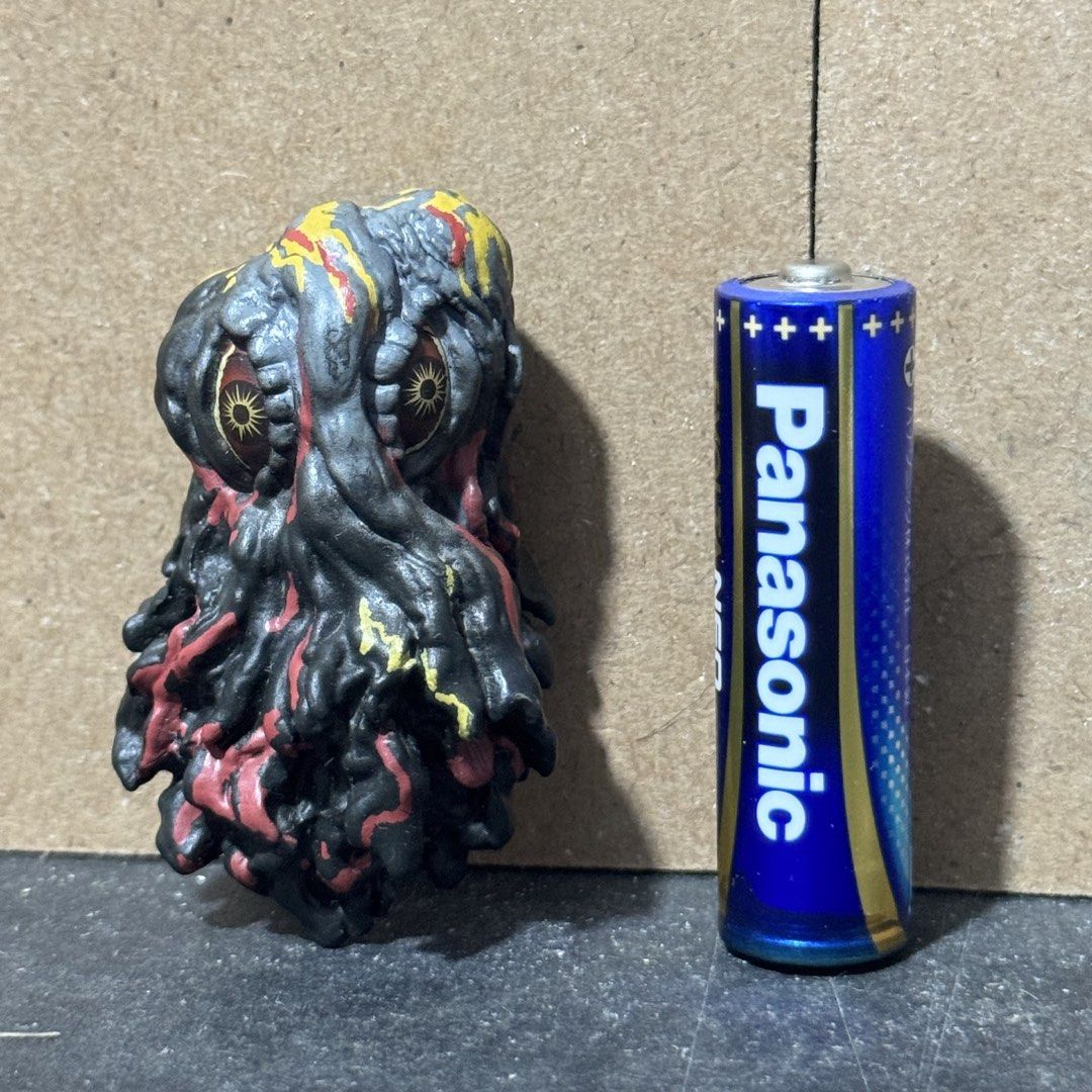 Hedorah Magnet Toho Godzilla Figure (Category: Figurines & Statues) located in Cuyapo. Submitted by blacksheepshop (Listing ID 1466778067, Image 1). Description: - Character: Hedorah (Official Toho Co. Ltd) - Size: Tiny, around the size of an AA battery - Features: Black, red, and yellow paint details with a built-in bottom magnet - Authenticity: Includes molded official Toho stamp and BSP China 67896 marking - Condition: Clean surface and well-m