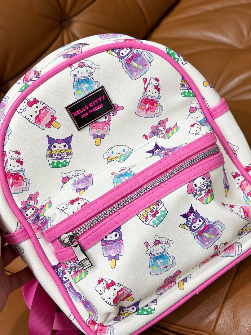 Hello Kitty and Friends Backpack (Category: Babies & Kids Fashion) located in Pasig City. Submitted by angelcstlln (Listing ID 1466891412, Image 2). Description: Cute Hello Kitty & Friends mini backpack Bought this at Claire’s in the US. Super nice quality and comes with adjustable straps at the back. Perfect for girls ages 3–7. Condition: Has a few very light colored pencil marks on top (barely noticeable) and some pen marks inside. Other than t