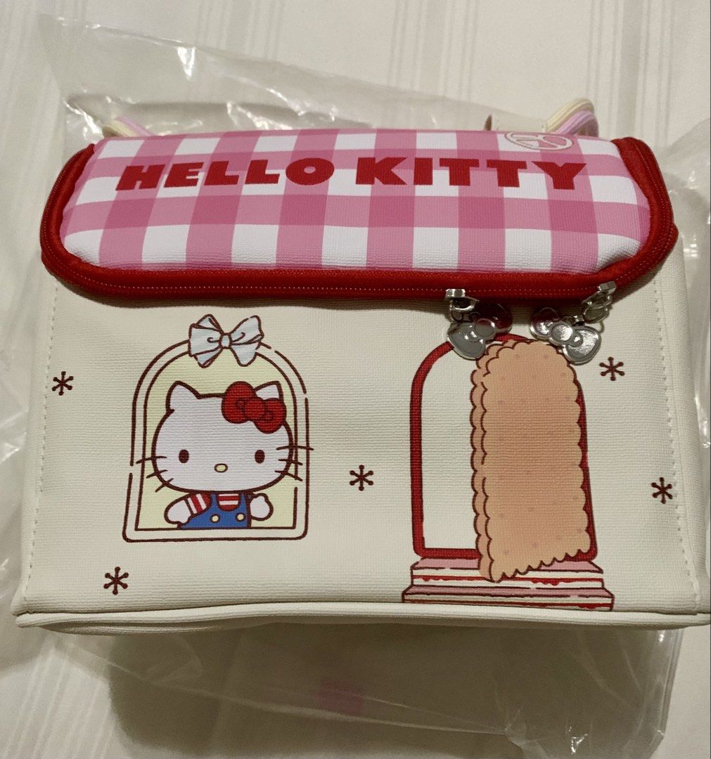 Hello Kitty Lunch bag (insulated) (Category: Tote Bags) located in Valenzuela. Submitted by simplyolive85 (Listing ID 1466936072, Image 1). Description: Hello Kitty Insulated lunch bag. Can be for kids and adults Color: cream/red Size : 9x8x5 in (Width x Height Depth) Manual measurement .