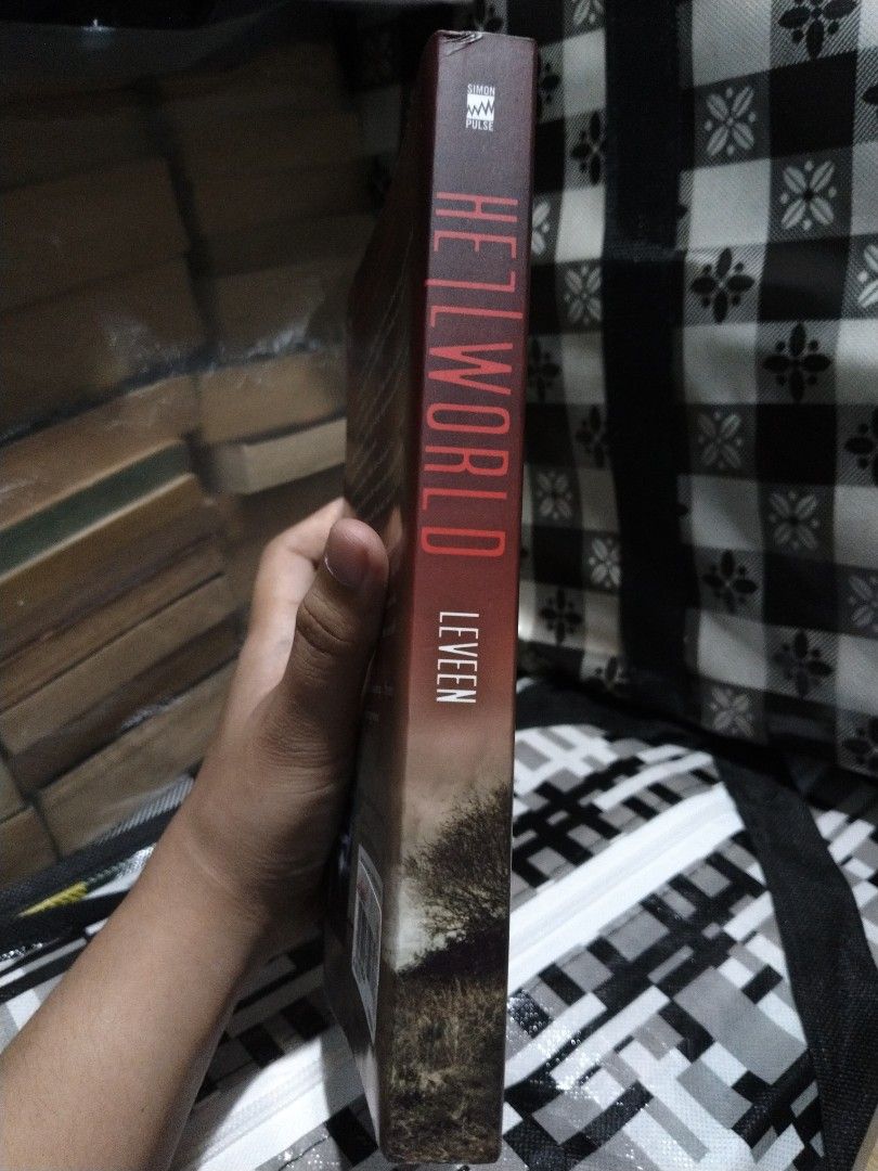 Hellworld Novel by Tom Leveen (Category: Storybooks) located in Taguig. Submitted by jener.498 (Listing ID 1466929492, Image 2). Description: - Title: Hellworld - Author: Tom Leveen - Publisher: Simon Pulse - Genre: Young Adult (YA) thriller / suspense fiction - Format: Paperback - Condition: Readable copy with all pages intact - Great addition for YA book collectors.