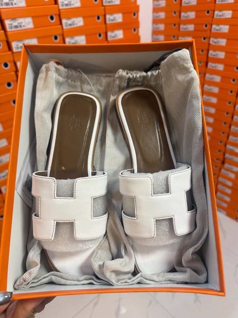 Hermes Flat Sandals (Category: Flats & Sandals) located in Manila. Submitted by e-tindahan (Listing ID 1466964428, Image 2). Description: -with box and paperbag Available size: 36.37.38.39.40 📌 Please check the last image carefully before ordering. Nandun na po lahat ng kailangan tandaan. Mode of Payment (MOP): 💸 GCash, Maya, GoTyme, BDO, RCBC, Landbank Mode of Delivery (MOD): 🛵 Lalamove / GrabExpress for Same-day delivery 🚚 J&T Express / LBC