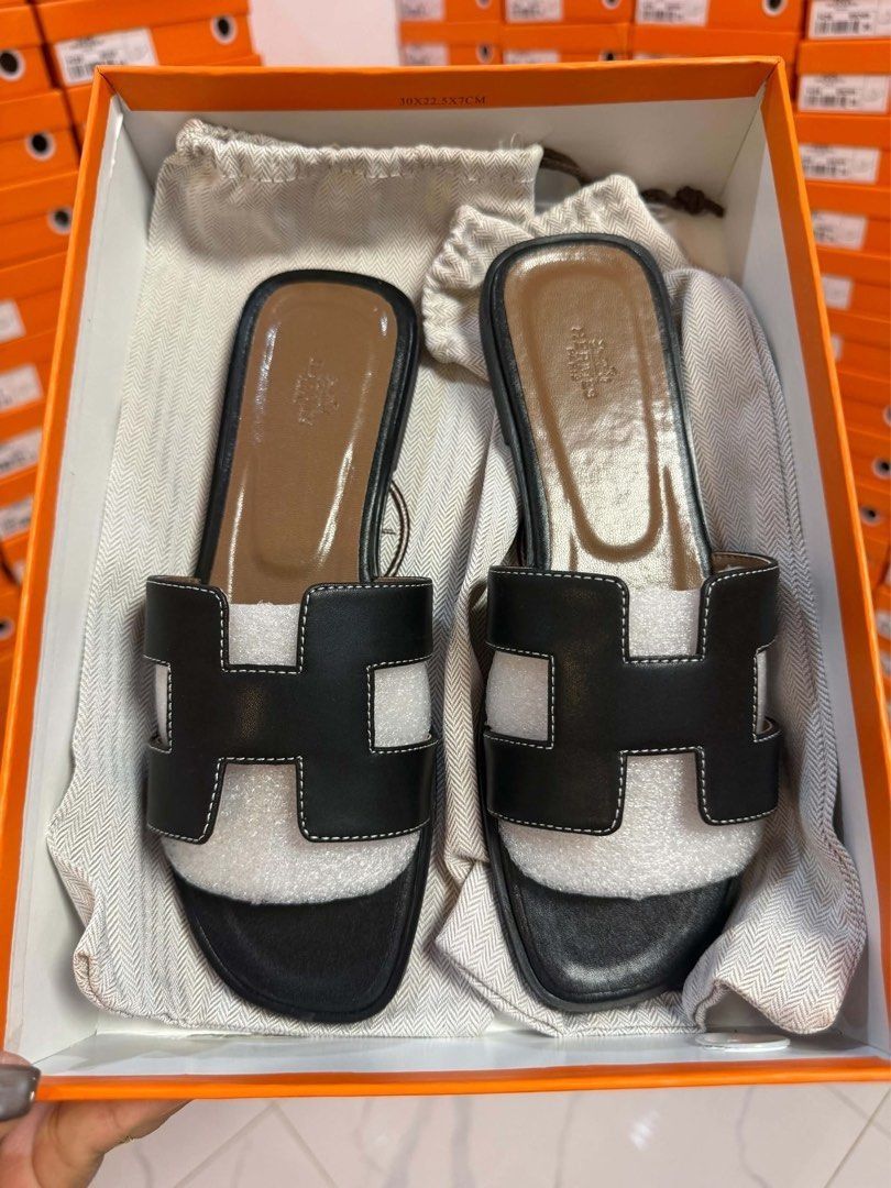 Hermes Flat Sandals (Category: Flats & Sandals) located in Manila. Submitted by e-tindahan (Listing ID 1466964505, Image 2). Description: -with box and paperbag Available size: 36.37.38.39.40 📌 Please check the last image carefully before ordering. Nandun na po lahat ng kailangan tandaan. Mode of Payment (MOP): 💸 GCash, Maya, GoTyme, BDO, RCBC, Landbank Mode of Delivery (MOD): 🛵 Lalamove / GrabExpress for Same-day delivery 🚚 J&T Express / LBC