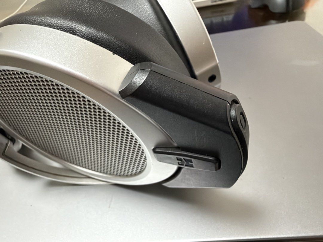 HIFIMAN DEVA Pro Planar Magnetic Headphones (Category: Headphones & Headsets) located in Pasig City. Submitted by kuyavictory (Listing ID 1466835467, Image 2). Description: - Model: HIFIMAN DEVA Pro open-back planar magnetic headphones - Design: Silver cups, metallic grilles, black padded headband, and black ear pads - Connectivity: Includes Bluetooth module attachment slot on the left ear cup - No Issues - Perfect for audiophiles looking for hig
