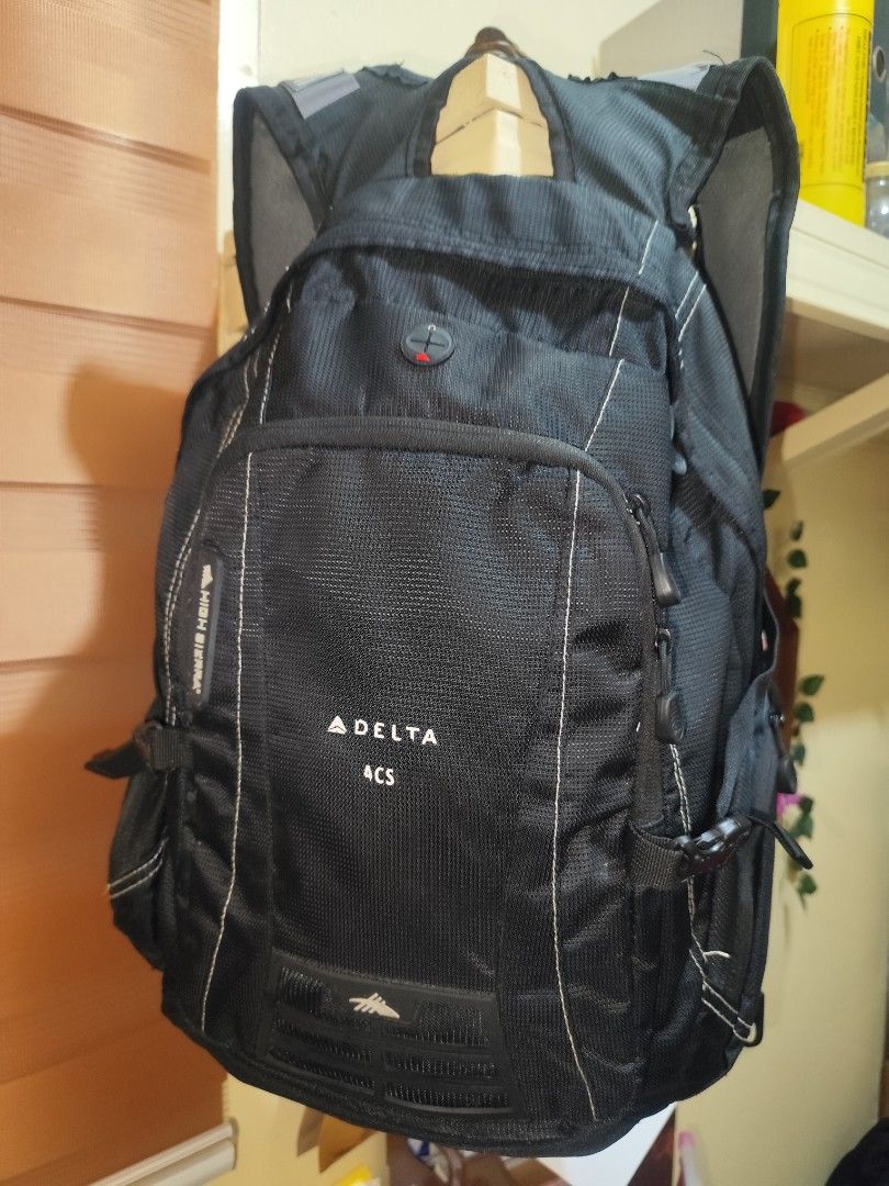 High Sierra Delta 4CS Backpack Black (Category: Backpacks) located in Naga. Submitted by semflewer (Listing ID 1466831743, Image 2). Description: - Brand/Model: High Sierra Delta 4CS Backpack - Color: Classic Black - Organization: Multiple zipped compartments for easy gear sorting - Comfort: Air flow padded back panel and suspension strap system - Durability: Durable mesh exterior with side compression buckles - Versatility: Ideal for school, wor
