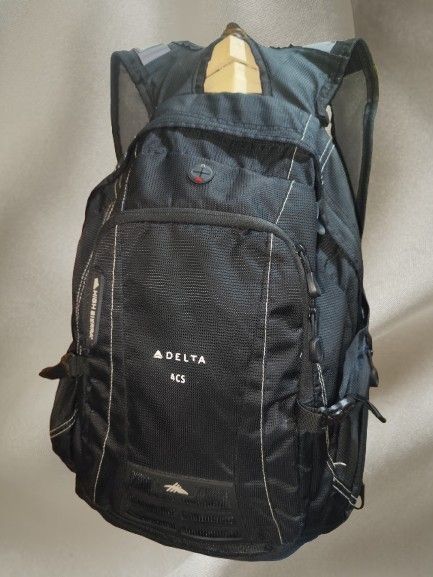 High Sierra Delta 4CS Backpack Black (Category: Backpacks) located in Naga. Submitted by semflewer (Listing ID 1466831743, Image 1). Description: - Brand/Model: High Sierra Delta 4CS Backpack - Color: Classic Black - Organization: Multiple zipped compartments for easy gear sorting - Comfort: Air flow padded back panel and suspension strap system - Durability: Durable mesh exterior with side compression buckles - Versatility: Ideal for school, wor