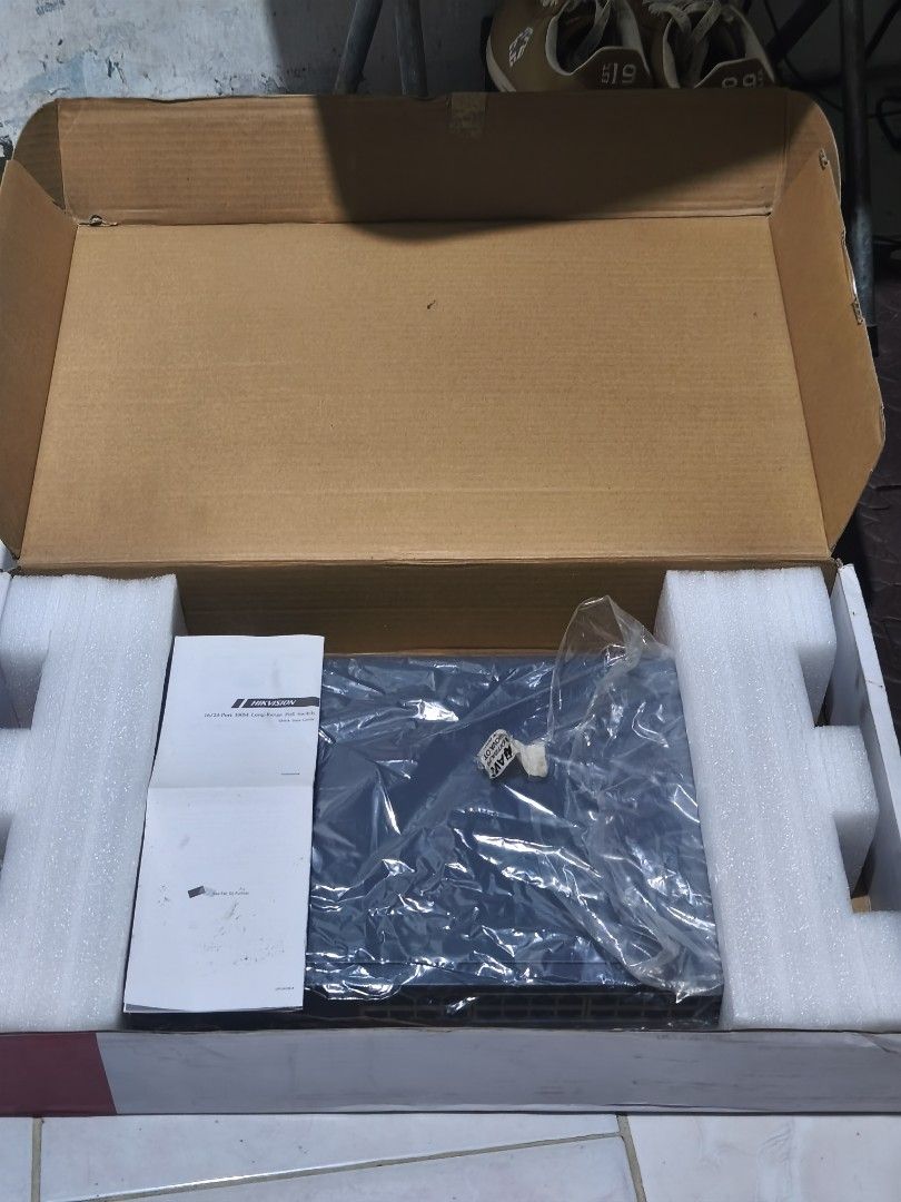Hikvision (Category: Networking) located in Manila. Submitted by markrbc (Listing ID 1466930673, Image 2). Description: - Brand: Hikvision Network Switch - Capacity: Up to 24 Ethernet ports with PoE support - Modes: Standard mode and Extend mode - Build: Heavy-duty metal housing with front status indicator lights - Condition: Tested and powers on normally - Inclusions: Original box, power cable, and quick start guide manual.