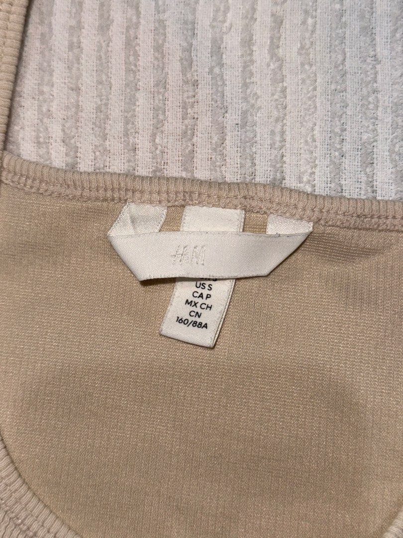 H&M Beige Tank Top (Category: Sleeveless) located in Naga. Submitted by sbcookieee (Listing ID 1466839831, Image 2). Description: .