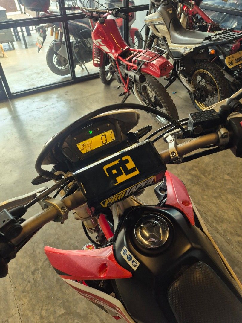 Honda CRF 250 L Supermoto Custom (Category: Motorbikes for Sale) located in Cebu City. Submitted by themanoy66 (Listing ID 1466903835, Image 3). Description: 2014 CRF250L. 38k mileage. Cebu City. Price 170k! Made in Japan Updated LTO registration Custom full exhaust system Brand new wheels & tires Decals by Hersticker Protaper Pastrana bend fatbar Zeta hand guards JFG seat cover Engine in perfect condition(serviced) New pads, bearings, filters et