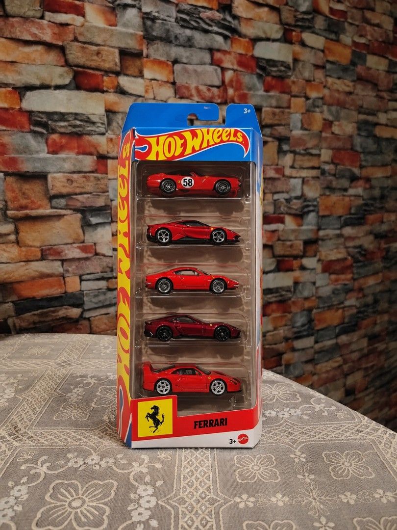 Hot Wheels Ferrari 5-Car Pack Diecast Set (Category: Vehicle & Diecast Models) located in Caloocan City. Submitted by toystv (Listing ID 1466831177, Image 1). Description: Hot Wheels Ferrari 5-pack special edition diecast set. Includes Dino 206 GT, SF90 Stradale, 365 GTB4 C, 12Cilindri, and F40 Competizione. Vibrant red finishes across all models with authentic racing details, badges, and wheels. Unopened packaging in pristine display condition. 