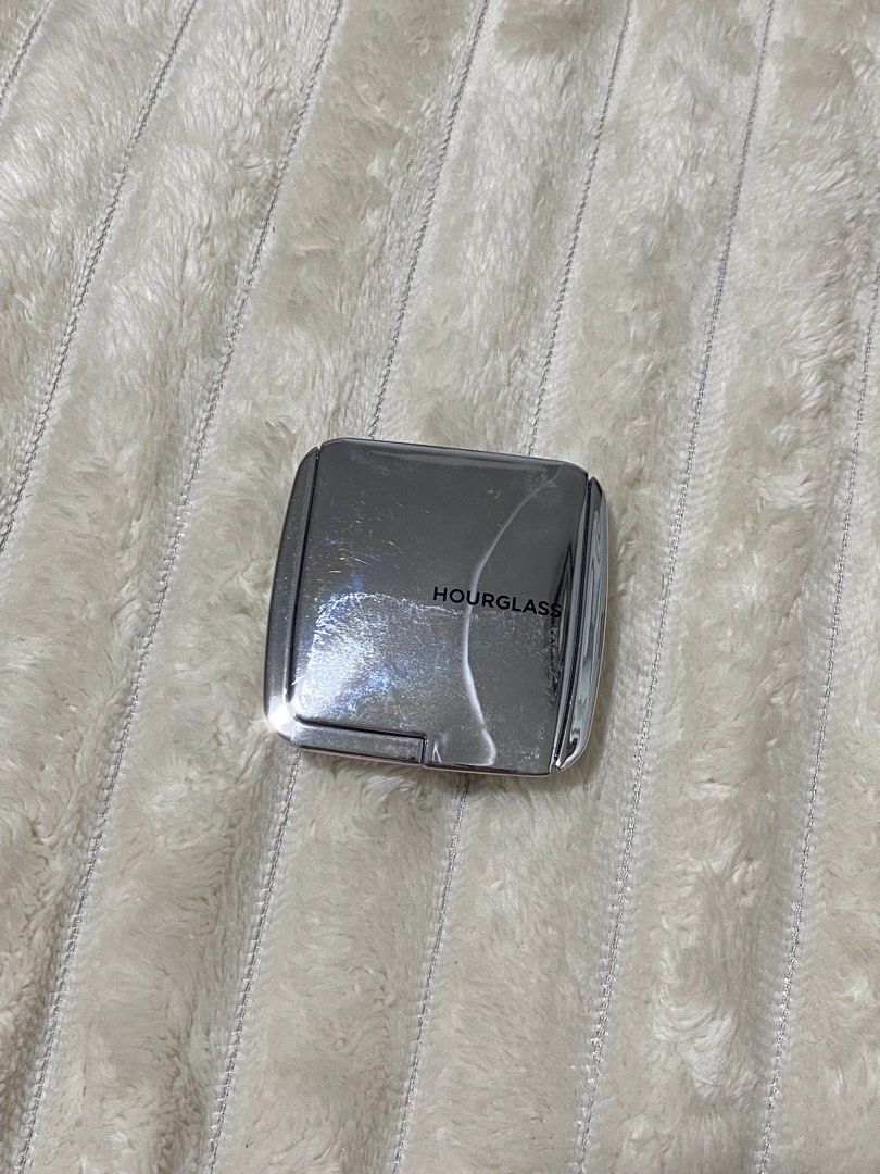 Hourglass Ambient Strobe Lighting Powder (Category: Makeup) located in Manila. Submitted by v_thrifts (Listing ID 1466803326, Image 1). Description: HOURGLASS AMBIENT STROBE LIGHTING POWDER - shade: Euphoric Strobe Light - normal surface scratches on the silver outer casing from storage - did minor swatching, practically untouched - no box included - original from Dubai RFS: extra - slightly negotiable for sure buyers.