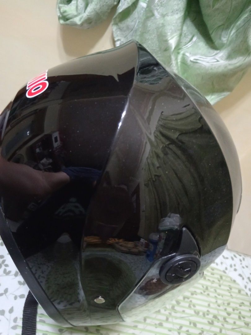 HPH Full Face Motorcycle Helmet Black (Category: Caps & Hats) located in Quezon City. Submitted by mylittlebaby2525 (Listing ID 1466895665, Image 1). Description: - Brand/Model: HPH Full Face Motorcycle Helmet - Finish: Sleek glossy black with a clear visor - Ventilation: Top air vent on the crown for airflow - Comfort: Padded interior lining - Closure: Standard secure strap underneath - Condition: Clean exterior with minimal wear, perfect as a s